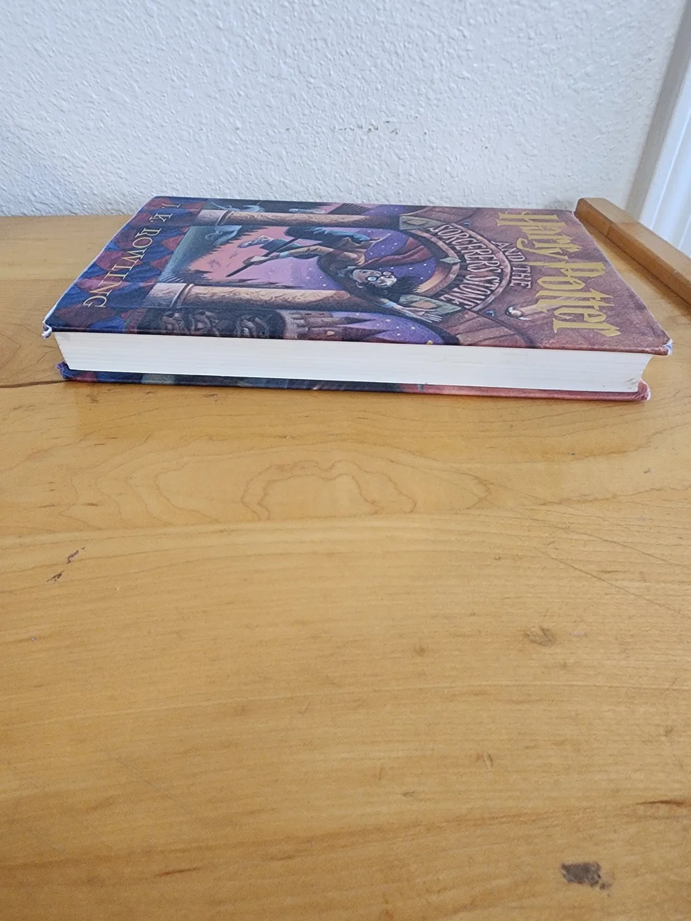 Harry Potter and the Sorcerer's Stone by J.K. Rowling - Purple Cover